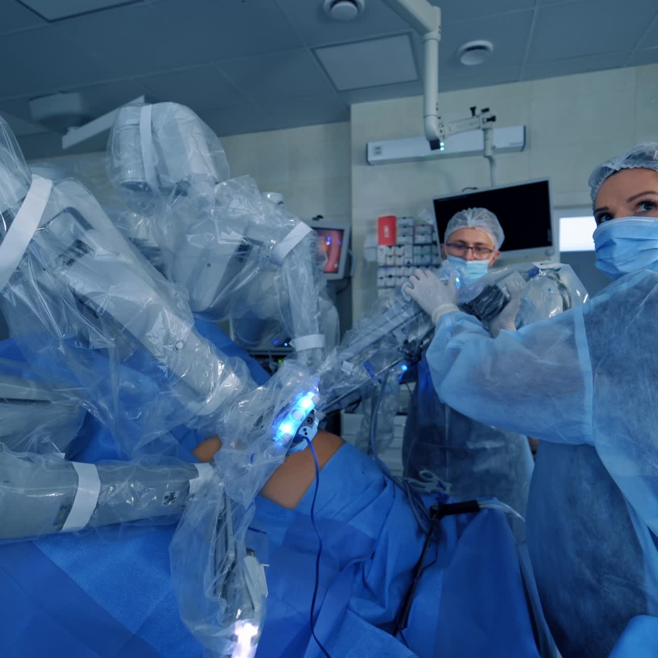 Surgical room in hospital with robotic technology equipment. Minimally invasive surgical innovation, medical robot surgery with 3D view endoscopy