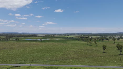 expansive farmland under a clear blue sky