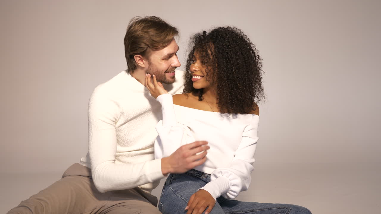 Interracial Couple Sitting Together