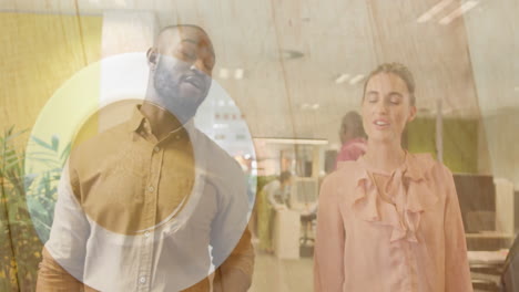 coworkers discussing business project in office, showcasing animated circular overlay graphic