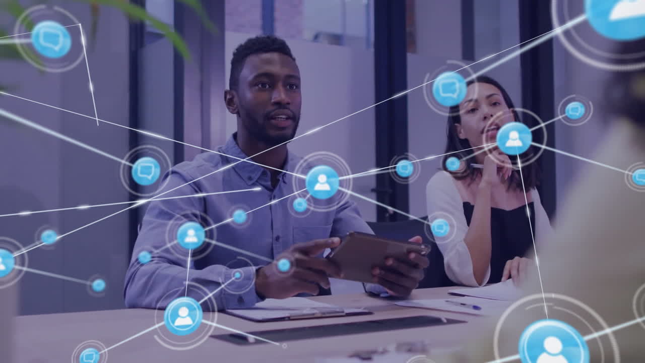 Animation of network of connections over diverse colleagues having meeting in office
