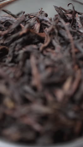 close up of dried black tea leaves