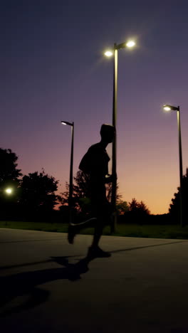 silhouette of a runner at twilight