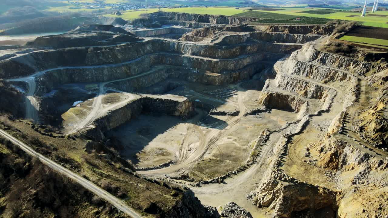 Uncovering the Earth's Treasures: An Aerial View of Limestone Quarry Excavation in Germany