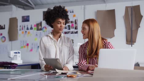 Two-colleagues-working-in-fashion-office