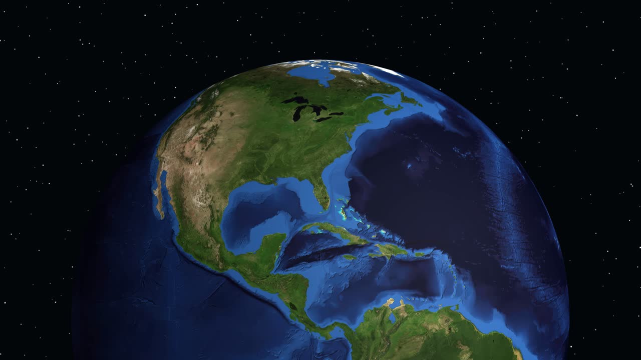 Il globo digitale ruota e ingrandisce sul Nord America, evidenziando Norman, Oklahoma, con sovrapposizioni di dati