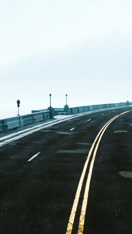 foggy road with double yellow lines