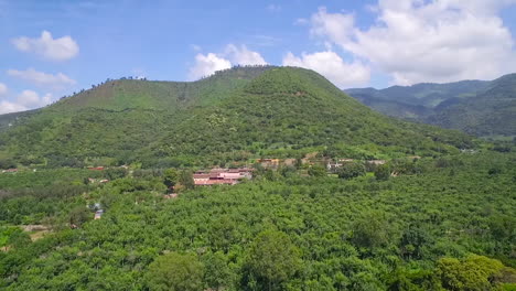 aerial over the jungles villages and farm fields of guatemala