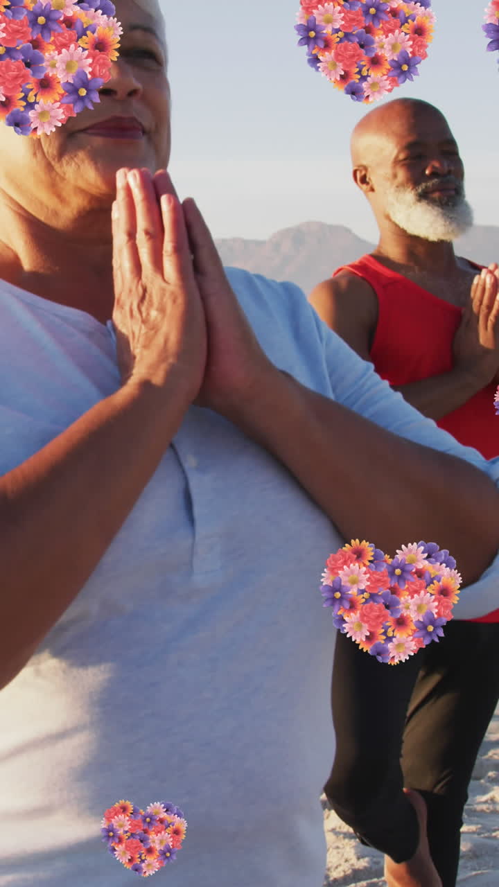 Animation of heart icons over senior african american couple practicing yoga at beach