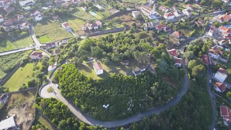 Birdseye-view-of-small-church-in-afife,-Viana-do-Castelo-in-a-sunny-day