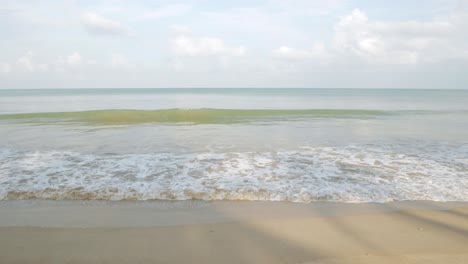 natural sea wave water with foam on the sandy beauty white beach, summer beac