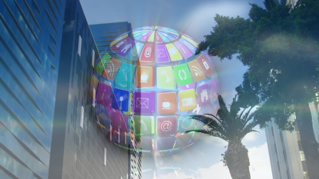 Animation of colorful digital icons forming globe over cityscape with tall buildings