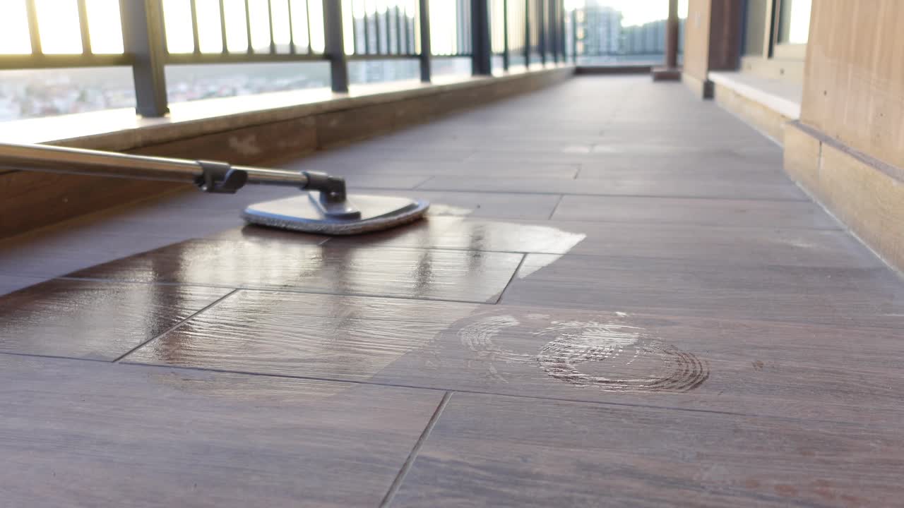 Cleaning a Balcony Floor