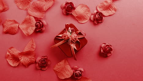 red gift box and flowers