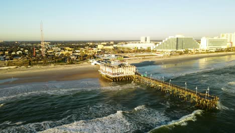 aerial orbit shot of dock at daytona beach shores