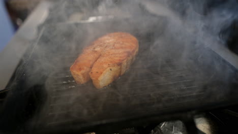 sizzling perfection: grilled salmon that combines crisp and tender in every bite