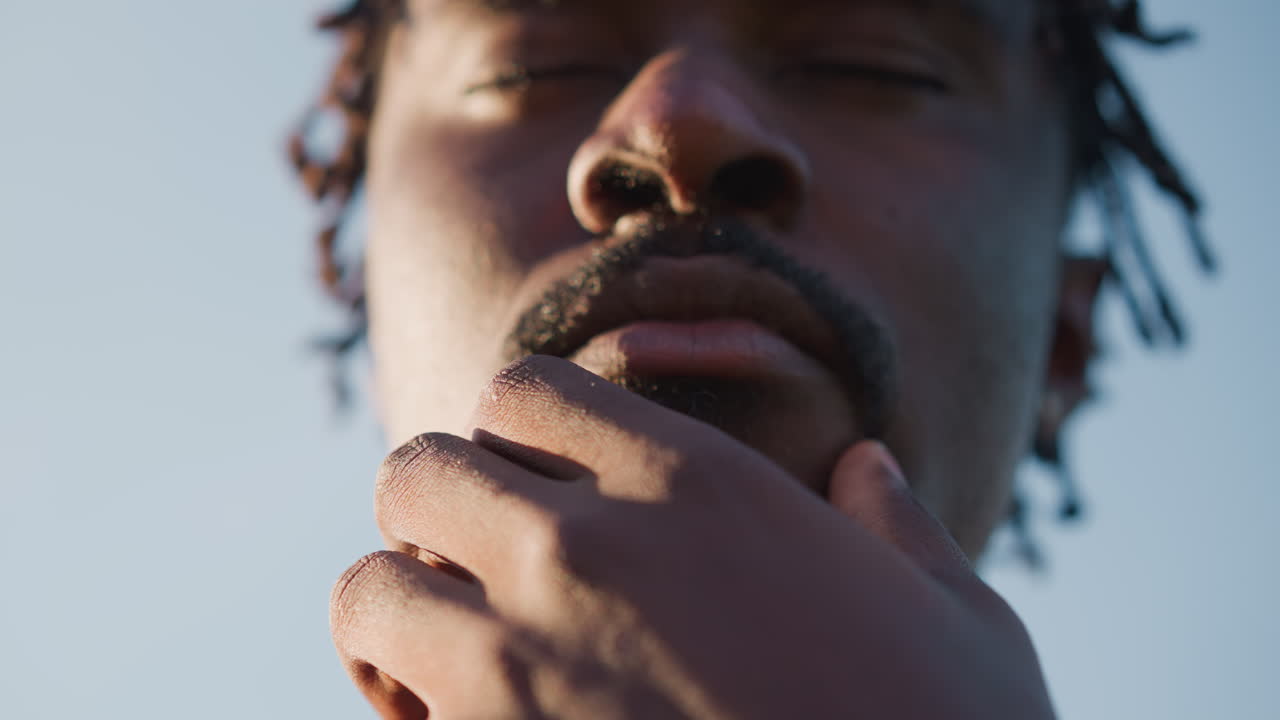 Serene Man Engages In Meditation, Peaceful Individual Performs Mindful Breathing Techniques, Composed Man Peacefully Engages In Controlled Breathing Exercises With Eyes Closed In Meditation
