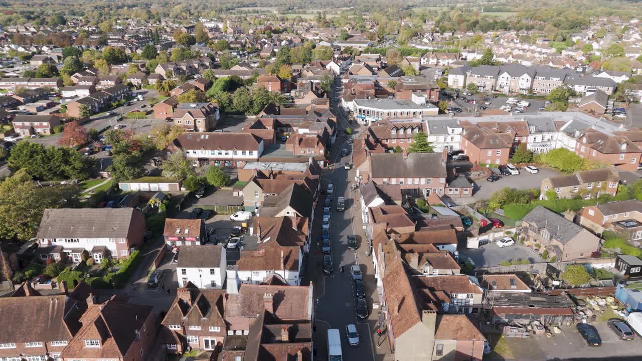 Aerial view of Burnham High Street, showing a lively, bustling town atmosphere with diverse architecture, Berkshire UK, October 2024