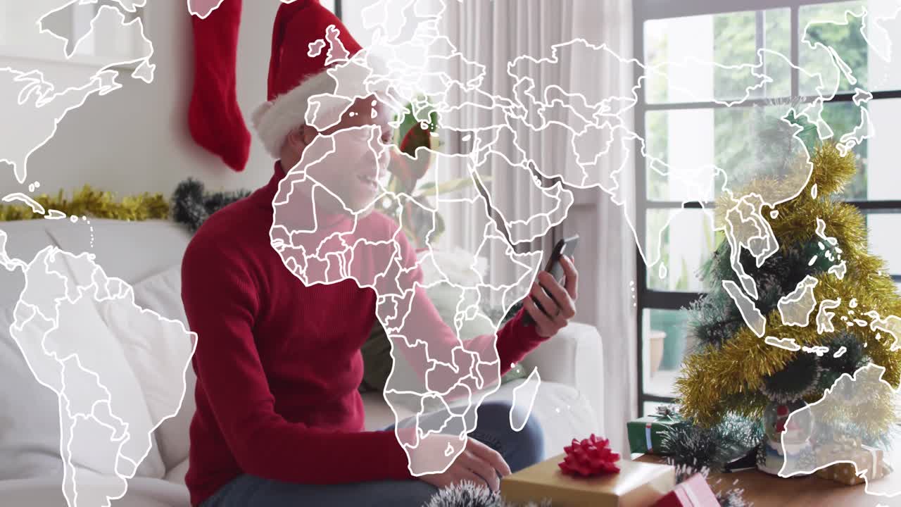 animación del mapa del mundo sobre el hombre albino afroamericano en navidad.