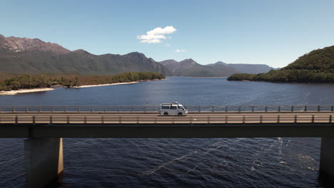 van crossing a bridge in tasmania