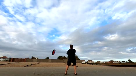 a man fying a kote quickly through the air making figures of eight