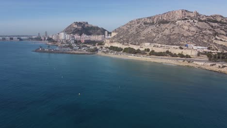 aerial reveal of the town of alicante from the north. regatta club.