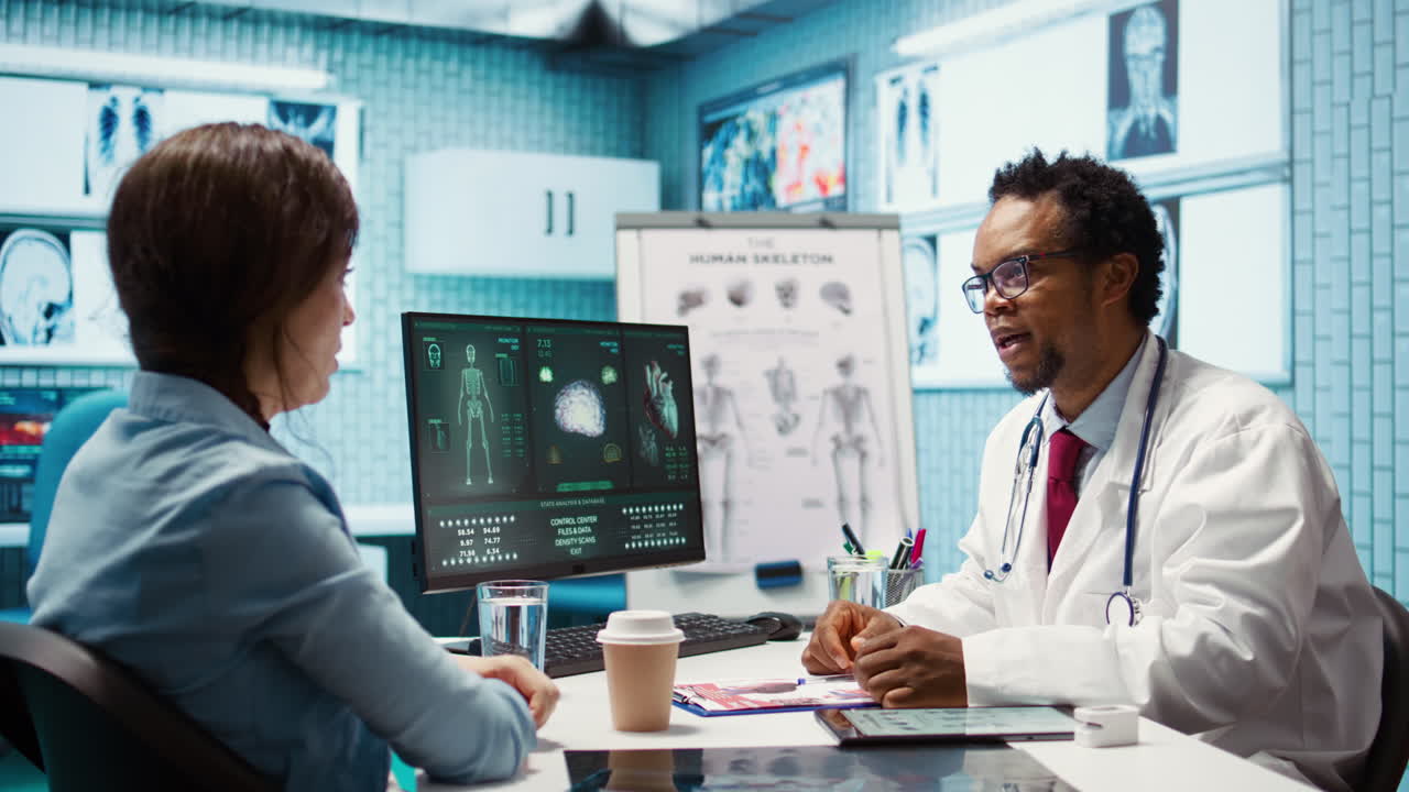 Doctor reading x ray imaging for a diagnostic report at consultation