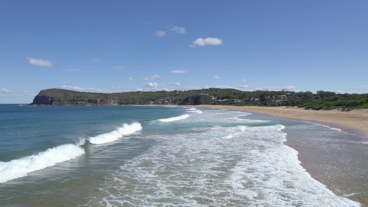Foamy Waves Splashing Onto The Shores Of MacMasters Beach On The Central Coast, New South Wales, Australia