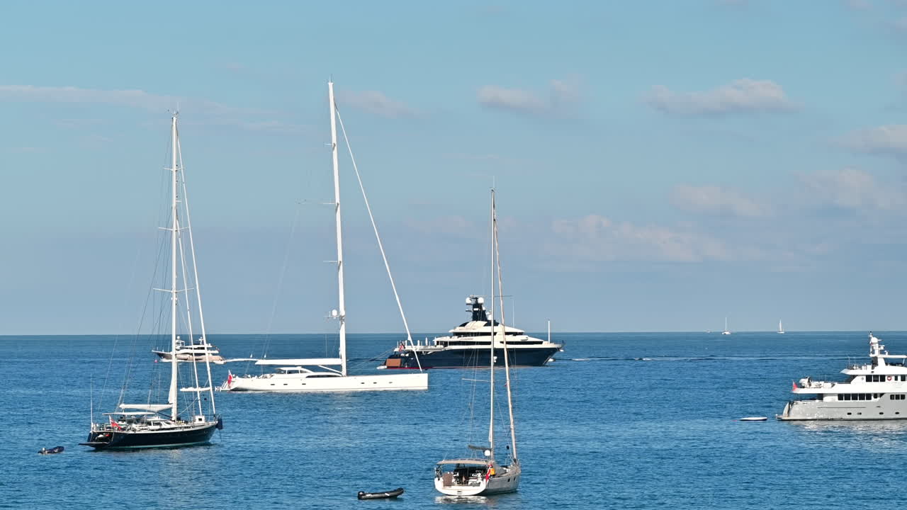 Mediterranean sea coast with floating yachts in Antibes, France
