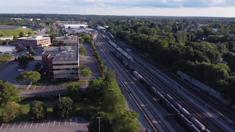 empty train tracks next a business park in braintree, massachusetts