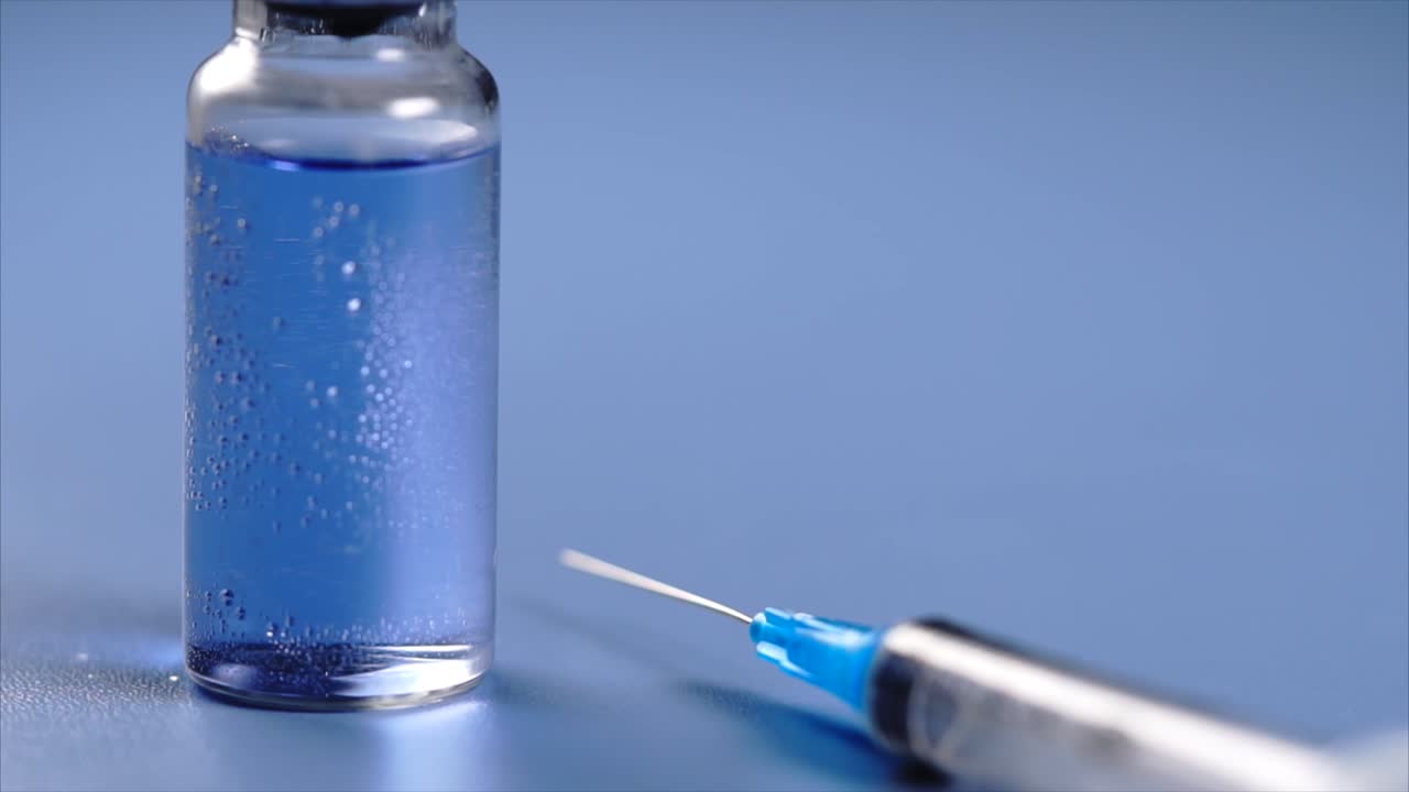 Vaccine Vial and Syringe