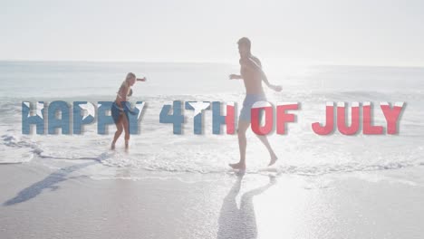 Animation-of-happy-4th-of-july-text-with-american-flag-pattern-over-couple-splashing-in-sea