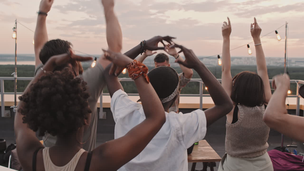DJ Playing Set at Rooftop Party
