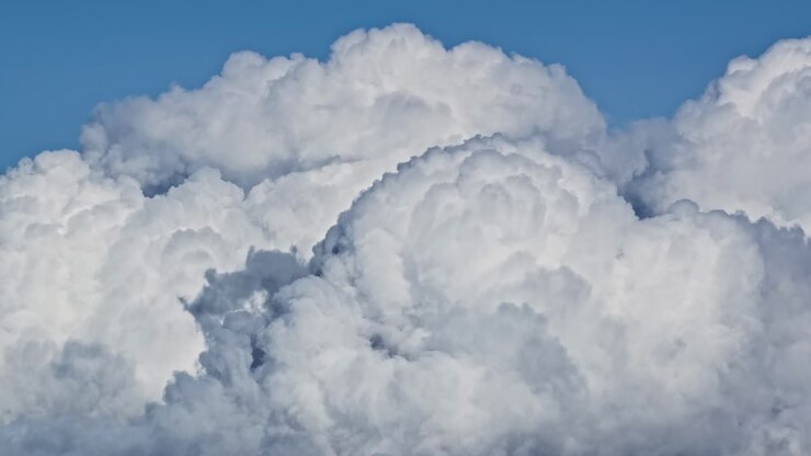 Vertically developed cumulonimbus clouds thunderclouds dense atmosphere