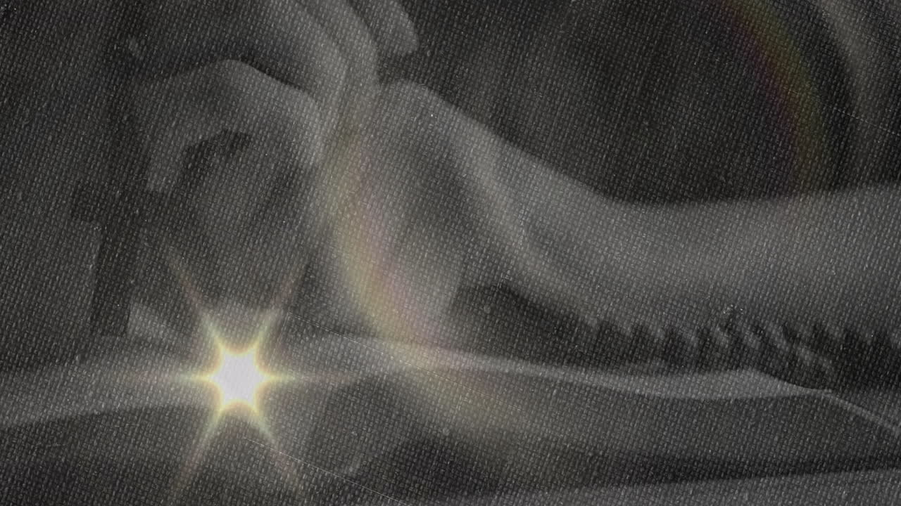 Holding cross with bright light effect, hands creating animation over background