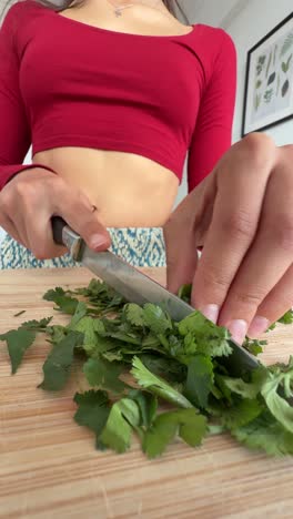 woman chopping coriander
