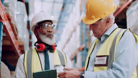 warehouse workers inspecting inventory