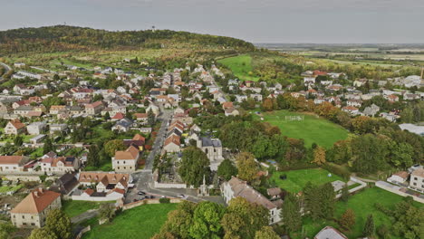 Kutna-Hora-Czechia-Aerial-v2-birds-eye-view-fly-around-Sedlec-Ossuary-the-cemetery-church-of-all-saints,-tilt-up-reveals-oldest-Cistercian-cathedral-in-Bohemia---Shot-with-Mavic-3-Cine---November-2022