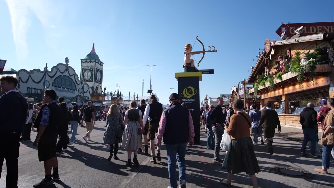 Theresienwiese in 2024 bursts with life, hosting Oktoberfest, filled with colorful beer tents, bustling crowds, vibrant parades, lively music, and traditional Bavarian festivities.