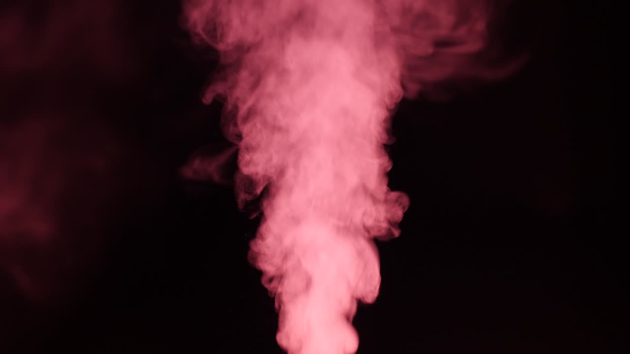 un humidificador con una luz circular roja en el medio