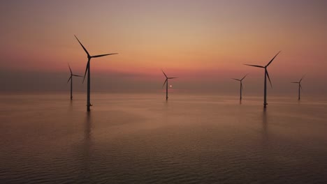 wind turbines producing sustainable renewable electricity in an offshore wind park