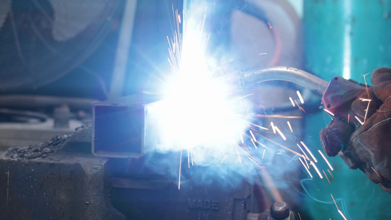Welding Metal Tube With A Mig Welder, Closeup Shot
