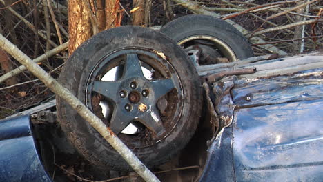 car accident on the slippery roads with black ice turned upside down