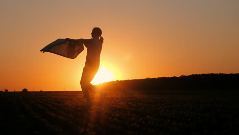 girl silhouette at sunset