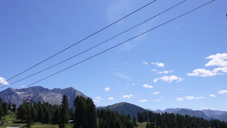 cable car moving over scenic mountain landscape