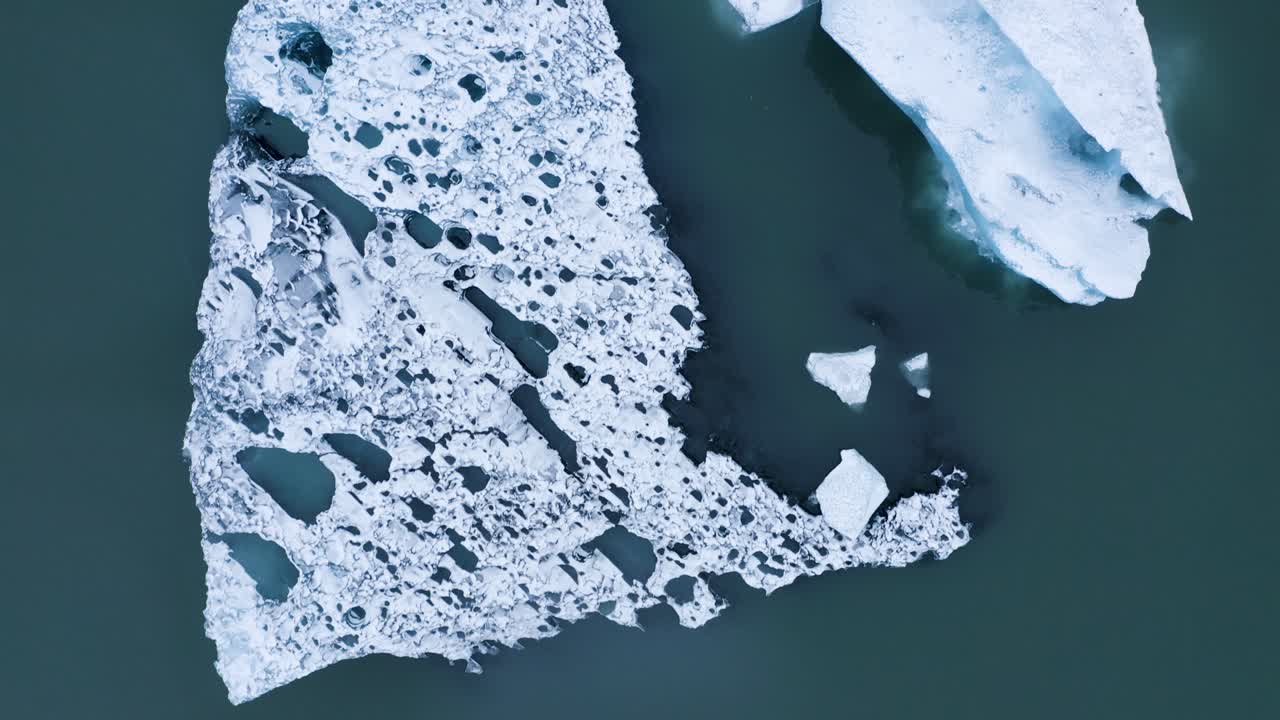 Top Down View Of Iceland’s Jökulsárlón Glacial Lagoon With Icebergs - aerial drone shot