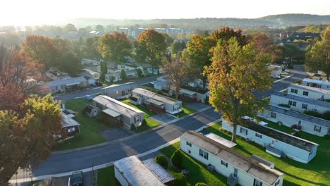 mobile home trailer park during autumn sunrise