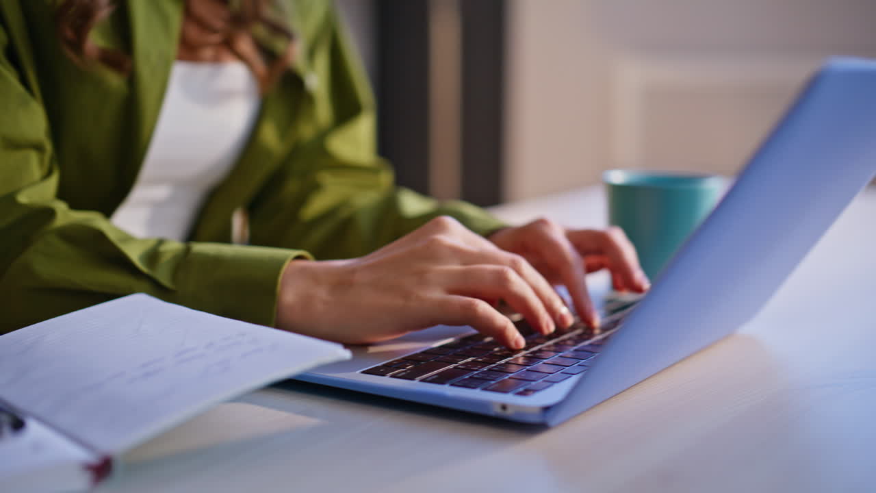 Woman working on a laptop in the office