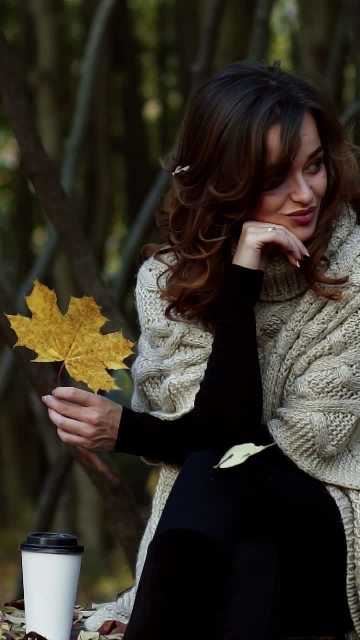 Autumn woman in autumn park. Autumn woman in autumn park. Warm sunny weather. Fall concept
