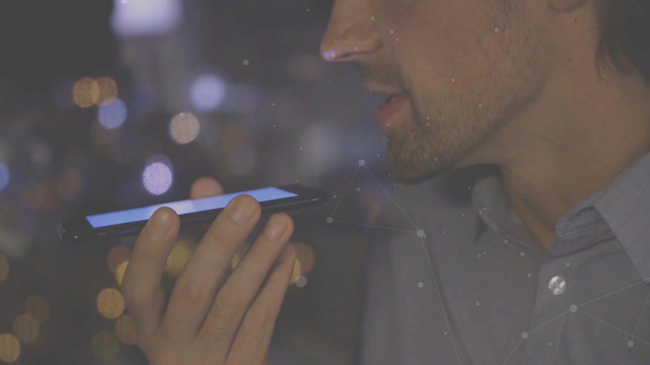 Man lifting phone and dictating voice note for tech demo, animated waveform reacting to speech